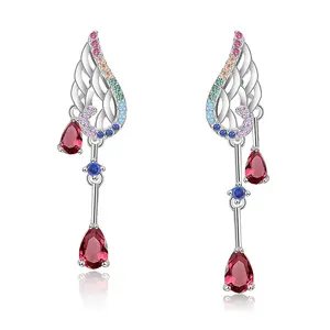 Mytys Asymmetric Wing Drop Earrings With Rainbow Gemstone Embellishments For Women