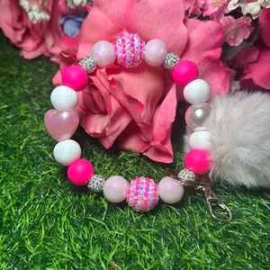 Bubble gum surprise wristlet color scheme white, hot pink,  and bling beads made with wire