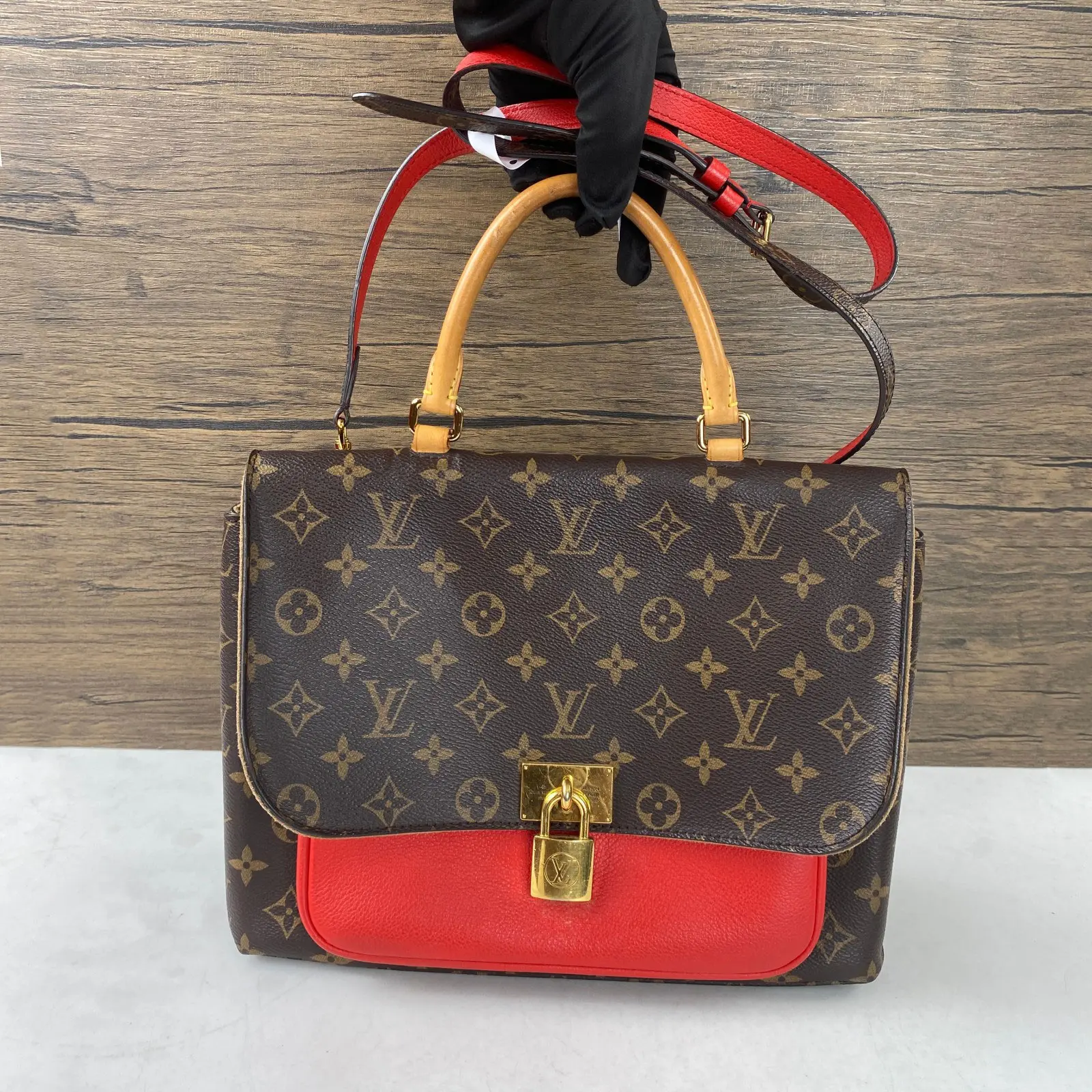 Pre-owned Louis Vuitton Monogram coated canvas Bag Accessories medium handbag in Monogram canvas with red leather trim.QG1548