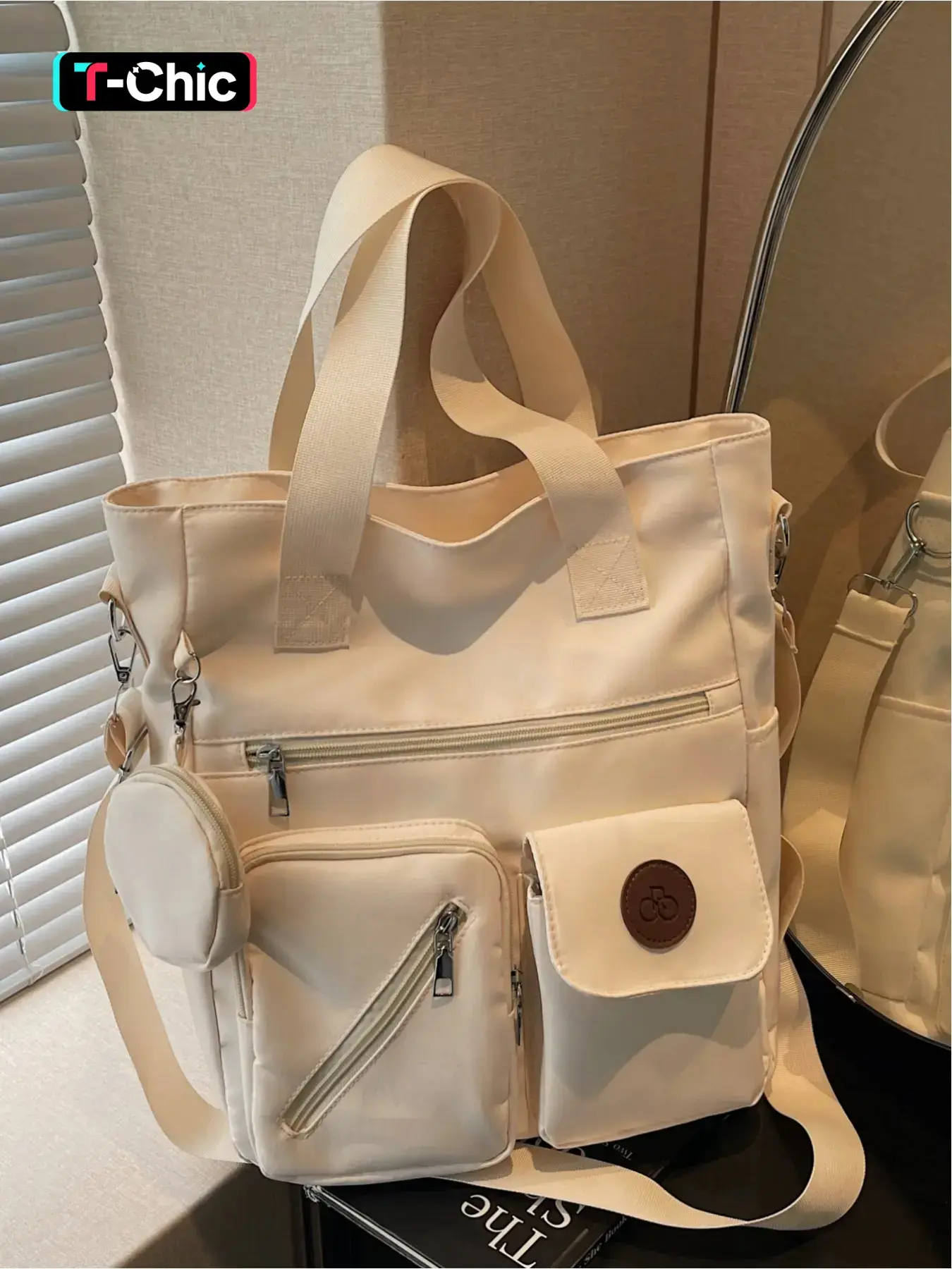 This large-capacity, multi-pocket, canvas casual tote bag, Practical bag, is a versatile accessory suitable for commuting, shopping, and everyday use. It can be worn as a shoulder or crossbody bag and features a zipper closure