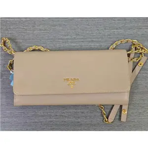 Pre-owned PRADA Saffiano Leather WOC Crossbody Bag in Nude Pink with Gold Chain Strap