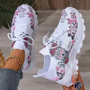 Women's floral and skull print breathable mesh sports shoes, lightweight low top running shoes, stylish ink and white design, suitable for casual wear, outdoor travel, and Halloween events