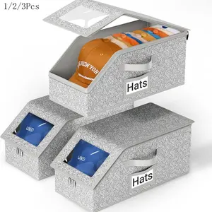 This wardrobe and hat organizer can hold up to 12 hats. It features a clear window, is made of heavy-duty cardboard with a zipper, and is suitable for wardrobe and hat organization. A great Mother's Day gift. Cap Organizer Storage Stackable Storage Box