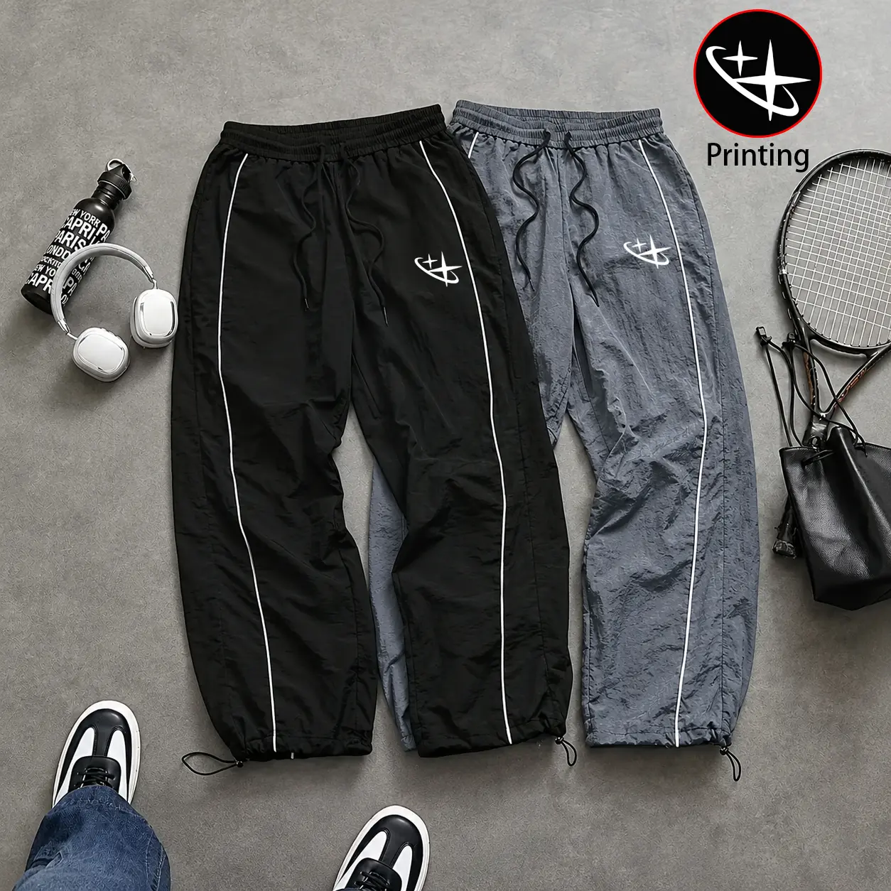 Viral TikTok star print parachute pants, Y2K celebrity logo striped pants, summer quick-dry athletic pants, unisex parachute pants, trendy streetwear waist-cinched pants, stylish breathable casual pants, suitable for various venues