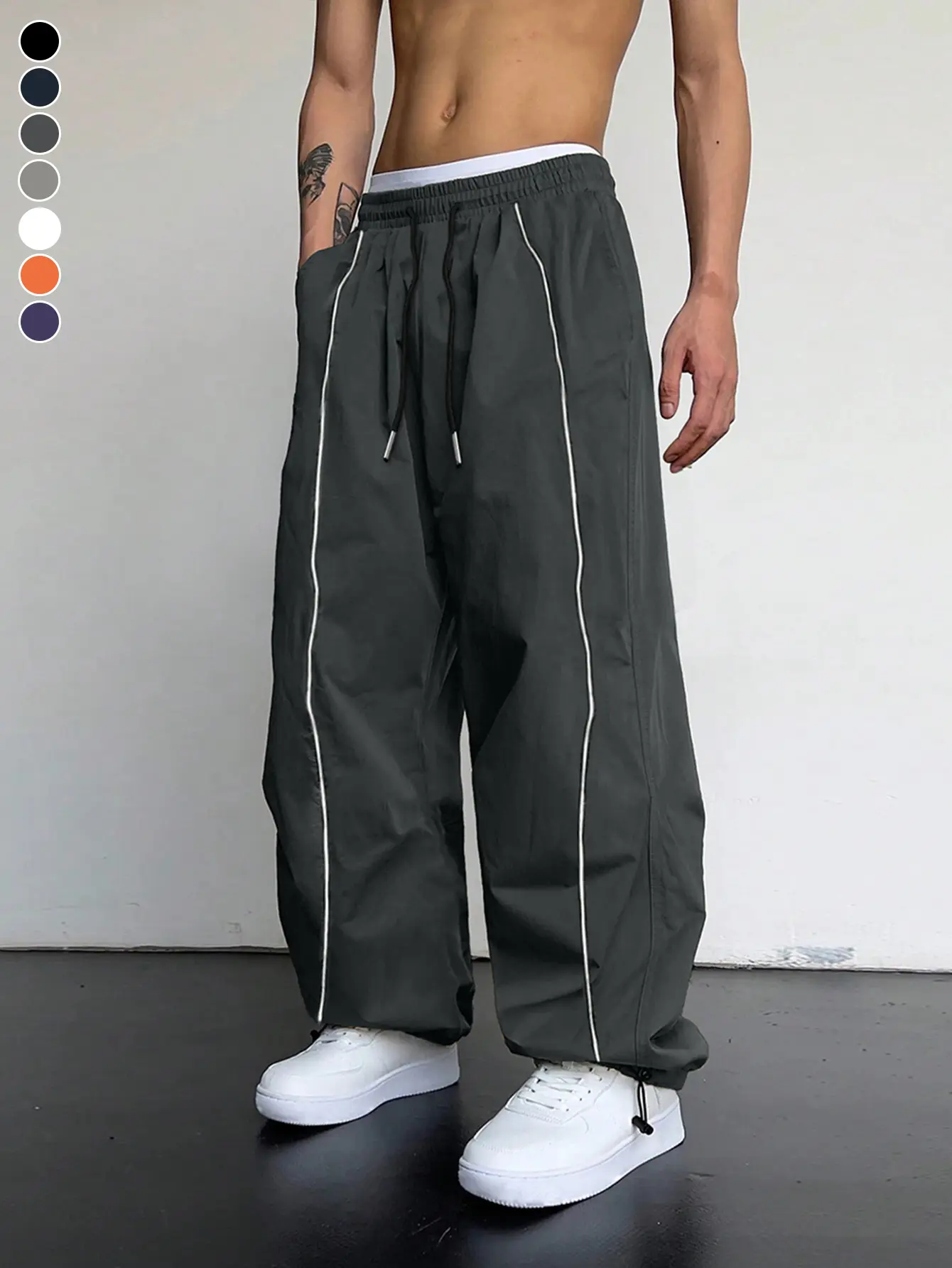 Men’s straight-leg black athletic pants with side stripes—fashionable and versatile, suitable for sports, casual wear, and everyday commuting, ideal for all seasons. Workout Jogger pantalones para hombre pants for men cargo pants for men