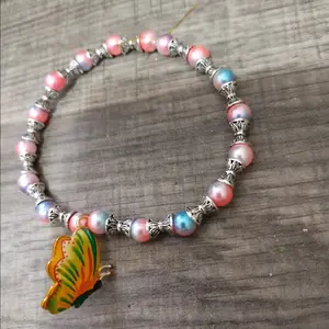 Butterfly and pearl bracelet