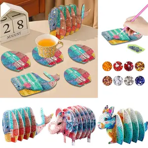 This 1-piece diamond painting set features wooden coasters with whale, elephant and rabbit patterns, circular diamond dot diamond Mosaic art. It is detachable and suitable for home table decoration and as a gift for festivals Diamond Painting Kits