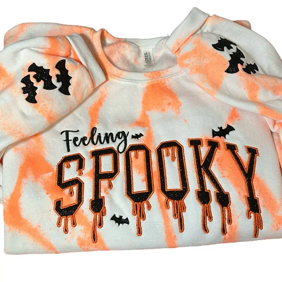 Feeling Spooky Tie Dyed Sweater With Glitter HTV Soft Womenswear Cotton Polyester Blend Embroidered Design Custom Appliqué Everyday Wear