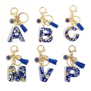 Royal Blue Evil Eye Initial Keychain A-Z with Tassel Charm for Handbags Backpacks & Car Keys Personalized Alphabet Accessory Iconic Evil Eye Boho Style Protective Charm