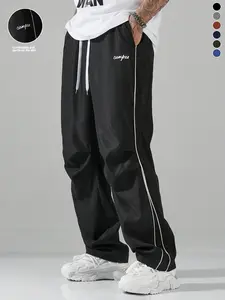 Men's Casual Letter Design Draped Wide-Leg Pants Early Spring New High Street Loose Drawstring Waist Casual Pants Black and White Colorblock Side Double Line + Skin-Friendly Smooth Fabric Daily Outing / Campus Style Lazy Fit Suitable for Spring Summer Wea