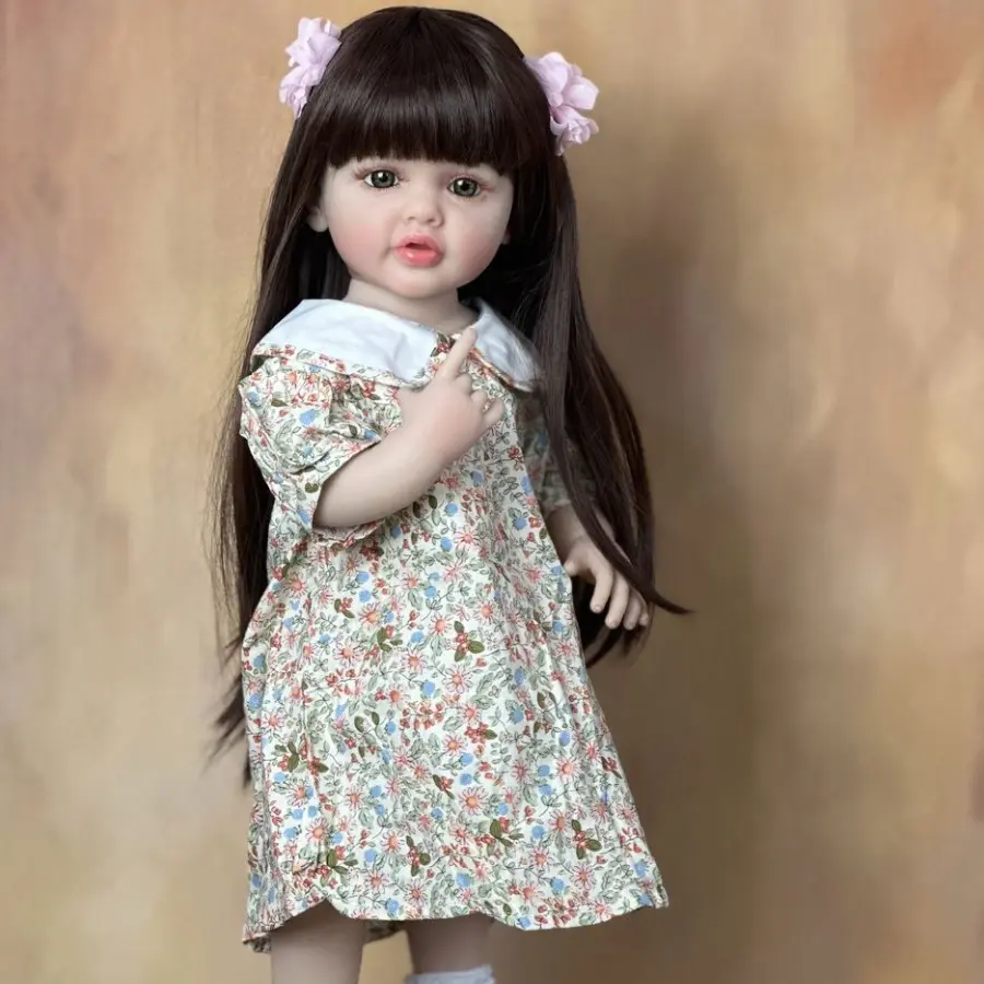 BZDOLL 22" Lifelike Soft Vinyl Reborn Baby Girl Doll with Long Dark Hair, Floral Dress & Accessories - Poseable Standing/Sitting/Lying,  Realistic Newborn Toddler Gift for  Collectors, Detailed Craftsmanship, Parents Present, Handcrafted Details