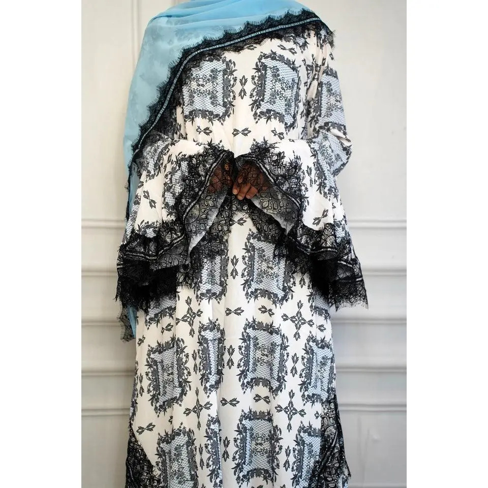 Laila-Designed with stunning lace detailing and flowing bell sleeves, this abaya offers the perfect balance of comfort and style. Includes a matching hijab