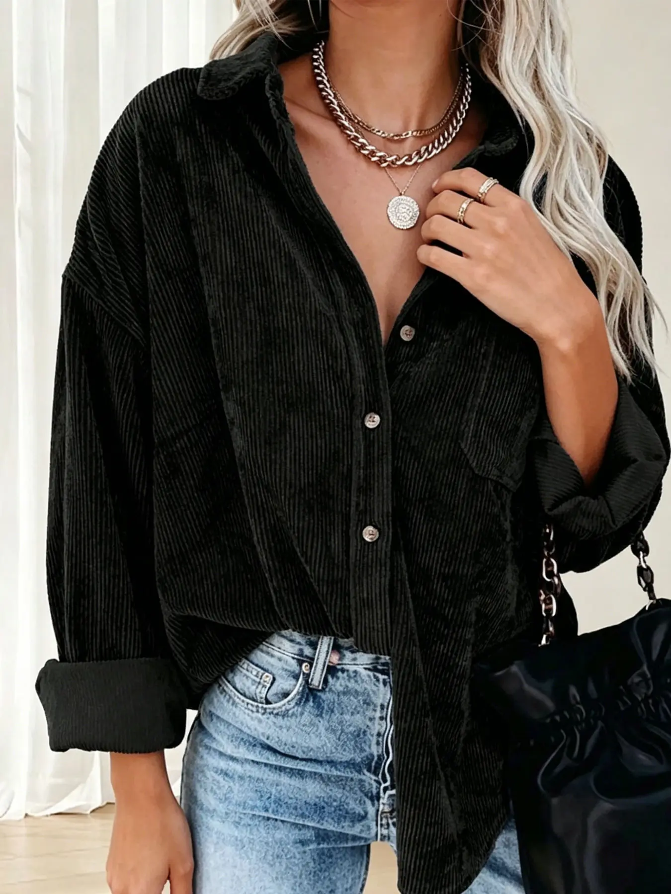 Plus size women's black corduroy lapel single-breasted loose-fit long-sleeve Casual Button Up Collared shirt, suitable for spring and summer, appropriate for daily commutingoing out on dates, casual gatherings, and various other occasions.