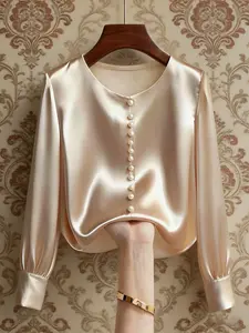 A women's casual fashion apricot round-neck long-sleeved pearl-buttoned commuter top, suitable for all seasons, ideal for home, indoor, and outdoor wear