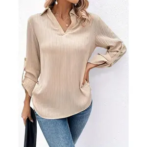 Women’s khaki collared V-neck blouse with rolled sleeves, suitable for both work and casual wear, and versatile for various occasions