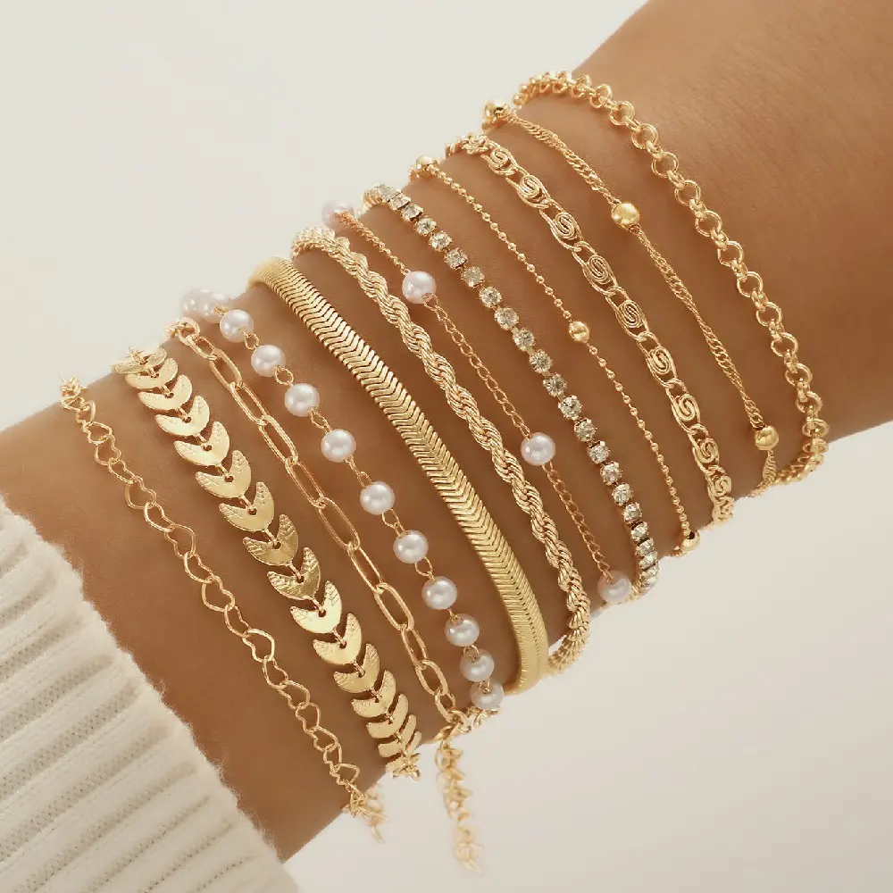 12-piece fashionable bracelet set featuring leaf-shaped faux pearls and heart-shaped beads; suitable for everyday wear, beach outings, and women’s jewelry. A must-have for girls and a perfect gift for Valentine’s Day, Mother’s Day, and any celebration. Mu