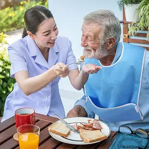Adult Feeding Bib with Pocket - Waterproof, Stain-Resistant Mealtime Apron for Elder Care Dining Assistance