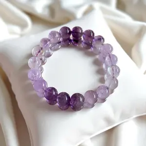 Natural Midnight Amethyst Bracelet - Purple Gemstone Beads on Soft Pillow Display