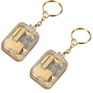 2Counts Portable Mechanical Music Box Keychain Set, Zinc Alloy Octave Box Pendant, Customizable DIY Car Decor Gift, Anti-Scratch Surface, Rust-Resistant, Stylish Keychain