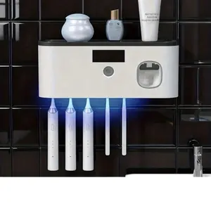 Electric Toothbrush Holder Wall Mount, With Toothpaste Dispenser, Suitable For Bathroom, USB Rechargeable Lithium Battery No Drilling Required. It Is A Smart Storage Organizer That Can Hold Up To 5 Toothbrushes.