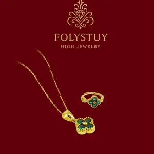 4-leaf flower ring FOLYSTUY, hand-set with green gemstones. The ring size can be adjusted for wearing. Model: YNZ61.YNK204-leaf flower pendant