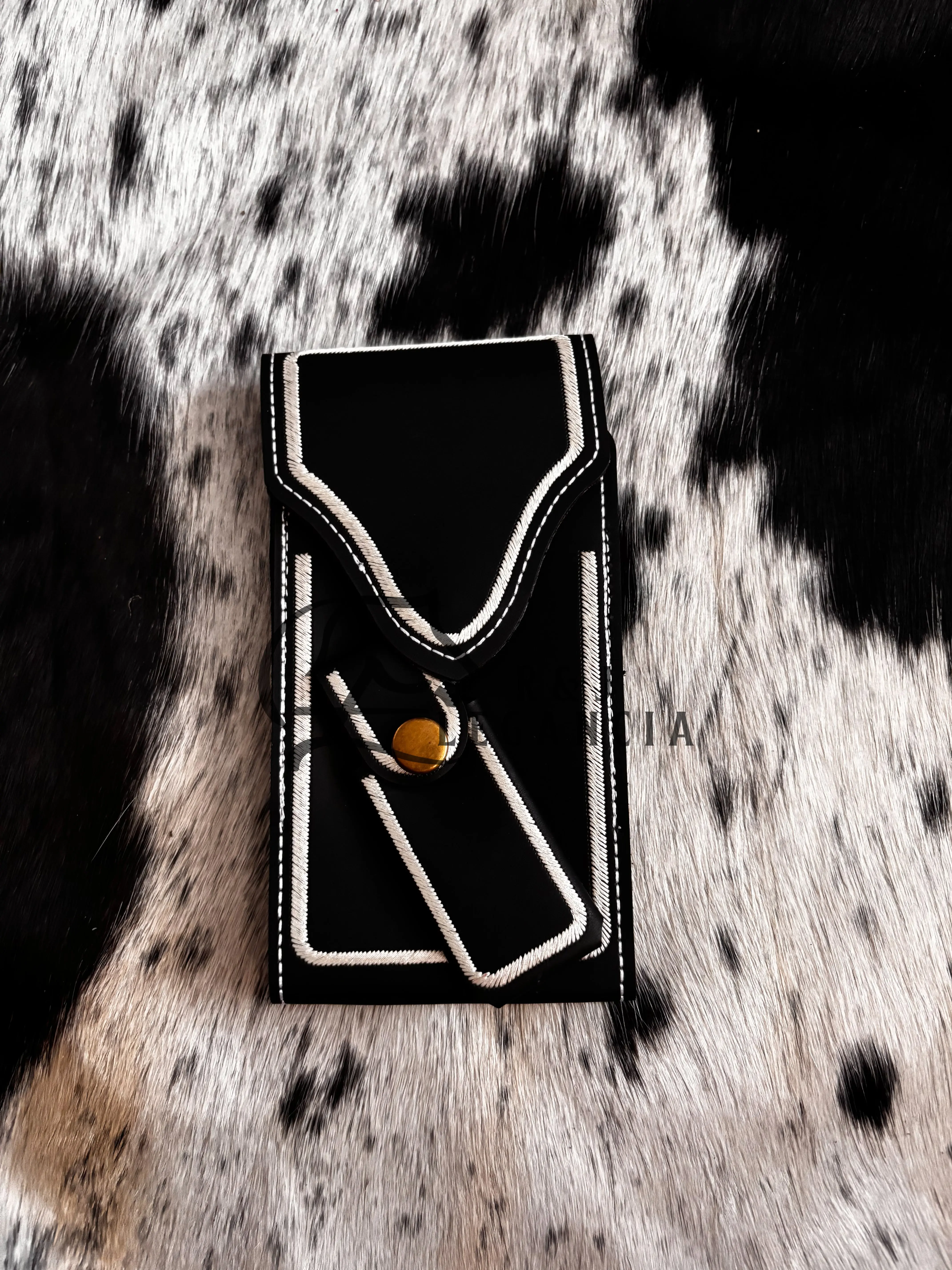 Funda de celular y navajero