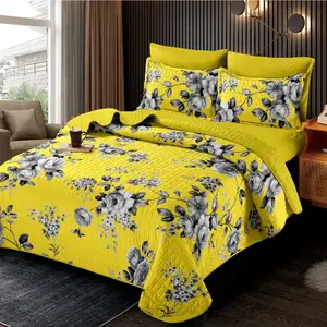 Yellow Floral Quilt Set with Matching Pillows and Yellow Bedding for a Vibrant Bedroom Look