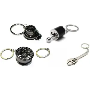 Five Piece Mini Auto Parts Keychains - Turbo, Six Speed Manual Gearbox Stick Shift, Wheel, Red Brake Rotor, Mini Wrench