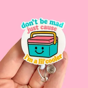 Glitter My Badge Don’t be mad just cause I’m a little cooler I’m badge reel for nurse and hospital workers. Badge clip Badge pull - Retractable swivel clip with a 360 rotation. Great gift for coworkers. Funny badge reels