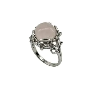 Natural light pink crystal ring with an oval floral design—women’s fashion accessory, elegant ring jewelry