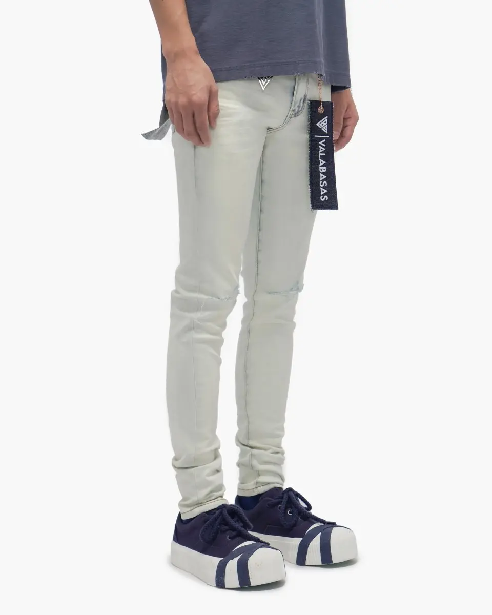Men's Arctic Blue Skinny Jeans in a Cotton Spandex Stretch Denim, Featuring Subtle Knee Distressing and a Clean Finish, Pants
