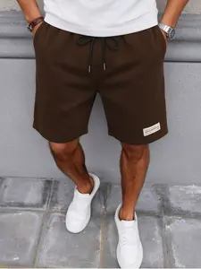Trendy Men's Brown Drawstring Waist Sweat Shorts, Elastic Waist Pocketed Knee Length Athletic Shorts, Soft Breathable Summer Streetwear for Street Style & Daily Wear #MensStreetwearShorts #CasualAthletic #SummerCasual