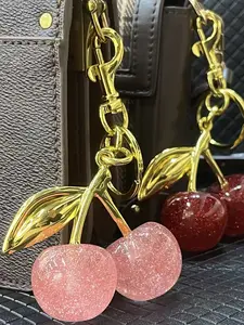 A fashionable and cute cherry design Kevchain, bag decoration, daily wear, also a surprising and exquisite small gift.