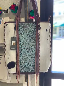 Myra tooled leather and cowhide tote