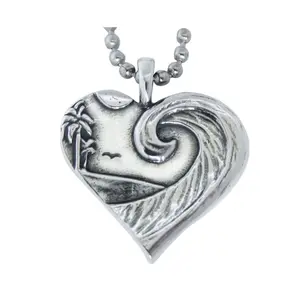 The Coastal Love Pendant by Strickly Boarding jewelry and Joe Paradise Made for surfers. Keep the stoke with you always!