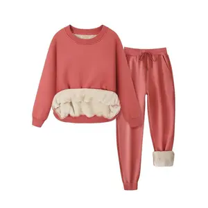 Women’s round-neck two-piece set featuring a casual, fashionable long-sleeve top and pants; warm, comfortable sportswear with lamb wool lining for everyday wear.