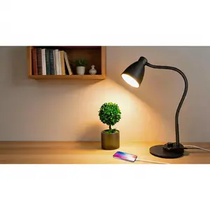 LED desk lamp featuring 3 color modes and stepless dimming. Built-in USB charging port, flexible gooseneck and smart auto-dimming, perfect for office and bedside use. AC adapter included. SURE