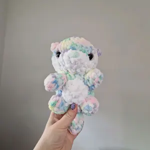 Pastel rainbow handmade plushie otter crochet amigurumi