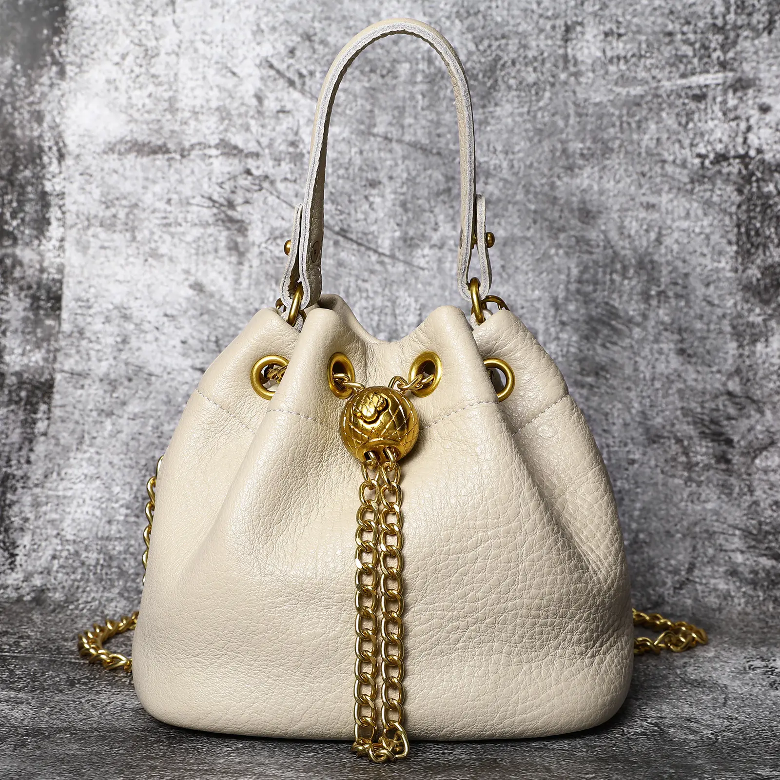 Minimalist Women's Leather Shoulder Bag, Fashion Bovine Leather Drawstring Bucket Purse with Golden Hardware, Versatile Commuter Handbag with Detachable Chain Strap