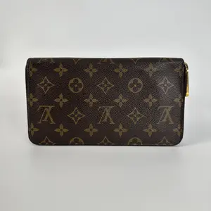 Pre-owned Louis Vuitton Leather Clutches & Wristlets Zippy Wallet | Monogram Coated OH1093
