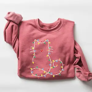 Adorable cat Christmas sweatshirt for women, perfect gift for cat lovers, featuring festive holiday design and cute Xmas graphic for cozy winter days