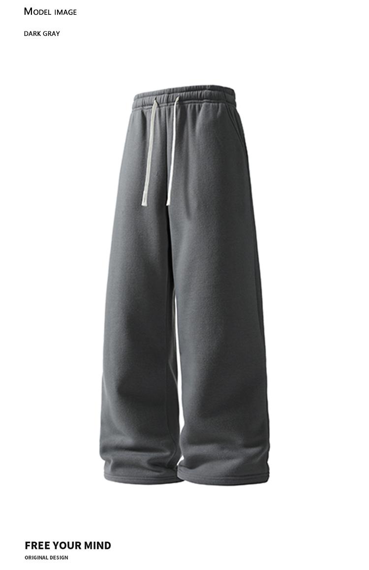 Pack of 4 men’s casual long pants featuring a drawstring elastic waistband and a loose fit for comfort and versatility. Suitable for everyday wear, leisure, sports, and fitness in spring and autumn.
