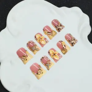 10 piece handmade duckbill nail decoration set, Nail art stickers, nude and yellow French nail patches, gold flowers, pearls, heart-shaped design, Y2K spicy girl style, suitable for parties and daily wear, including tool set, female nail gifts