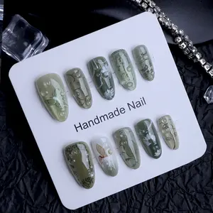 10 almond shaped acrylic press on nails spring summer lotus pond and leaf 3D gel cat eye fake nails flower print Flower Design Nails suitable for cute ladies and girls a must have for outings and dates Y2K nail art with jelly glue 1 piece 1 rub strip