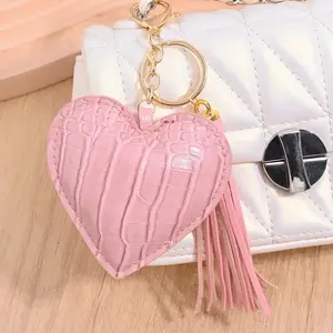 Pink Heart Bag Charm with Tassel and Gold Hardware - Stylish Accessory for Your Purse