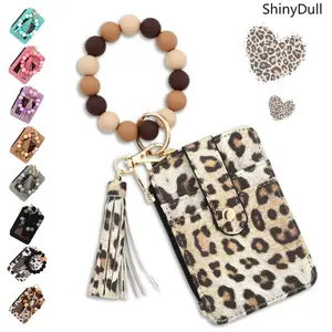 Women's RFID Slim Wristlet Wallet - Silicone Bracelet Keychain Card Carrying Holder with Tassel, Beaded Detail, Coin Compartment, Animal Print Casual Card Case