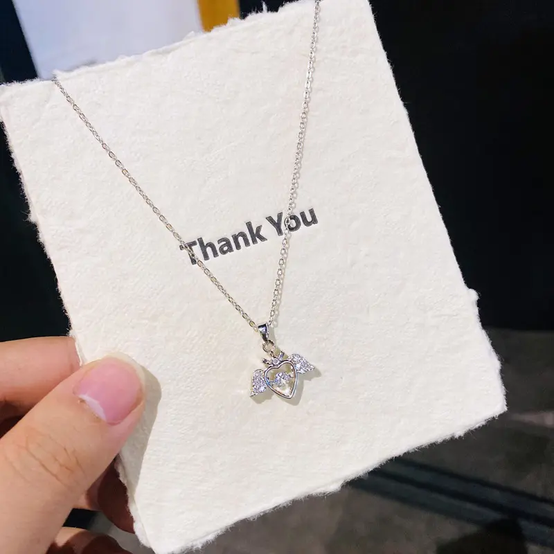 D32 Silver Dynamic Heart Wings