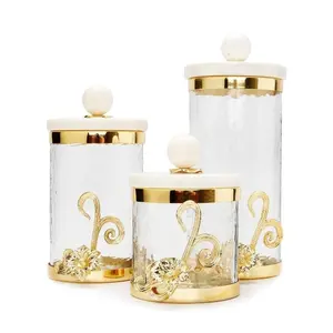 Glass Canister w/Gold Lotus Flower Décor & Marble Lid
