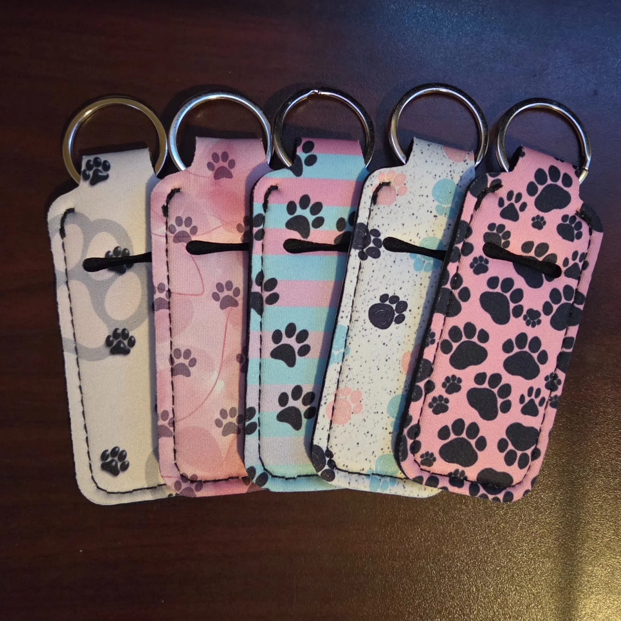 Cute Animal Paw Print Chapstick Holder Keychain - Portable Lip Balm Sleeve for Pet Lovers, Travel Accessory for Bags, Keychain Included, Never Leave Home