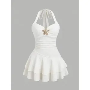 Elegant women’s halter neck mini dress, fitted silhouette, textured fabric, ruched chest area, metal embellishments, perfect for a summer beach vacation